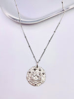 Collier Astro